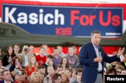 FILE - Republican U.S. presidential candidate Gov. John Kasich (R-OH) speaks at a campaign rally at the MAPS Air Museum in North Canton, Ohio, March 14, 2016.