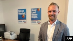 Jonas Duenzel, candidate for the state election for far-right Alternative for Germany (AfD) party, poses for a photo in Zwickau, Saxony, eastern Germany, on Aug. 14, 2024.