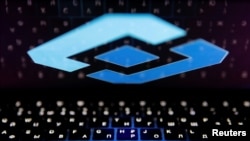 FILE - The logo of Russia's state communications regulator, Roskomnadzor, is reflected in a laptop screen in this picture illustration taken Feb. 12, 2019. 