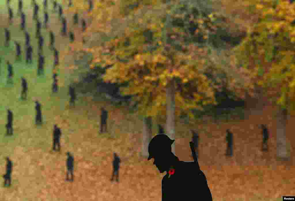 A view of &#39;For Your Tomorrow&#39;, an art installation of 1,475 silhouettes of World War II military personnel as a memorial to the soldiers killed in the 1944 D-Day landings 80 years ago, ahead of this year&#39;s Remembrance commemorations, at Stowe Gardens, in Stowe, Britain.