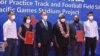 A photo taken on April 22, 2022, shows China's ambassador to the Solomon Islands, Li Ming, center left, and Solomons Prime Minister Manasseh Sogavare, center right, with other officials during the opening ceremony of a China-funded national sports stadium in Honiara.