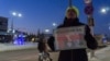 Ilya Kursov holds a sign that reads, "I wish for Putin to go away in the New Year." (Ilya Kursov)