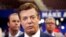 FILE - In this July 17, 2016, photo, then-Donald Trump campaign chairman Paul Manafort talks to reporters on the floor of the Republican National Convention, in Cleveland.