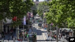 FILE - A general view of Bourke Street as shoppers return to the precinct in Melbourne, Australia, Oct. 28, 2020.
