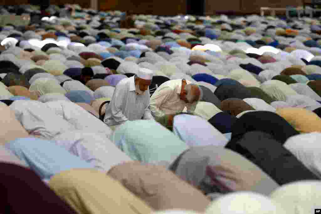 Muslims offer the last Friday prayer during the holy fasting month of Ramadan, at the Grand Faisal Mosque, in Islamabad, Pakistan.