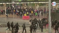 Manifestantes enfrentan cañones de agua y gases lacrimógenos en protesta en Colombia