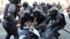 Police officers detain opposition protesters during a May Day rally in Saint Petersburg, Russia May 1, 2019. REUTERS/Igor Russak 