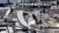 Boats are piled on each other at the Southport Marina following the effects of Hurricane Isaias in Southport, N.C., Tuesday, Aug. 4, 2020. (AP Photo/Gerry Broome)