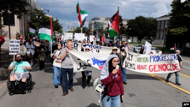 FILE - Pro-Palestinian demonstrators protest in support of the Palestinians who have died in Gaza outside of the Arab American National Museum in Dearborn, Michigan, on Aug. 11, 2024.