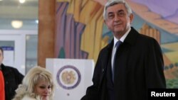 Armenia's President Serzh Sarksyan casts his ballot during a parliamentary election at a poling station in Yerevan, Armenia, April 2, 2017. 