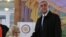 Armenia's President Serzh Sarksyan casts his ballot during a parliamentary election at a poling station in Yerevan, Armenia, April 2, 2017. 