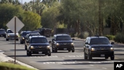 President Barack Obama's vehicle and motorcade are seen leaving Thunderbird Country Club in Rancho Mirage, Calif., Saturday, Feb. 13, 2016. On Monday and Tuesday, Obama will be with the leaders of the Association of Southern Asian Nations (ASEAN).