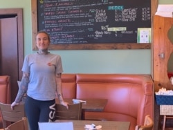 Server Syndi Brooks, a married mother of one who works at a San Diego eatery, relies on tips to help support her family. (Courtesy Sydni Brooks)