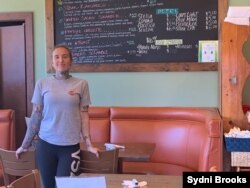 Server Syndi Brooks, a married mother of one who works at a San Diego eatery, relies on tips to help support her family. (Courtesy Sydni Brooks)