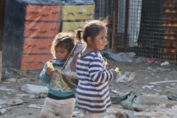 Thousands of children from dozens of countries have been stuck in al-Hol Camp in Syria for a year, after their parents fled the last Islamic State stronghold, pictured Feb. 18, 2020. (Heather Murdock/VOA)