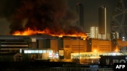 Crocus City Hall, a large music venue on Moscow's western edge, burns after a shooting, March 22, 2024. (AFP Photo/Moskva News Agency)