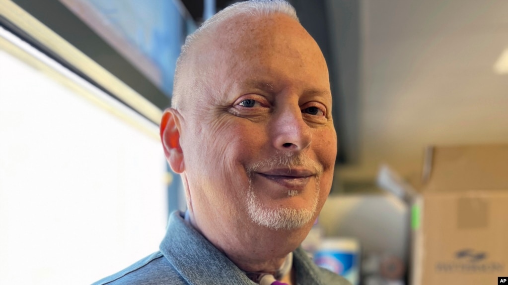 In this photo provided by the Mayo Clinic, Marty Kedian poses for a photo in Mayo Clinic’s Head and Neck Regenerative Medicine Laboratory in Scottsdale, Ariz., on June 12, 2024. (Mayo Clinic via AP)