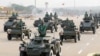 FILE - Military personnel participates in a parade on Armed Forces Day in Naypyitaw, Myanmar, March 27, 2021. 