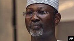 Nigeria's electoral chief and academic Attahiru Jega attends a meeting with staff from the Independent National Electoral Commission in Abuja, March 17, 2011