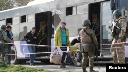 Azovstal steel plant employee Natalia Usmanova, 37, who was evacuated from Mariupol, arrives at a temporary accommodation centre during Ukraine-Russia conflict in the village of Bezimenne in the Donetsk Region, May 1, 2022. 