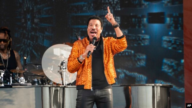 FILE - Lionel Richie performs at the New Orleans Jazz and Heritage Festival, on Apr. 29, 2022. Richie has been inducted into the Rock & Roll Hall of Fame. (Photo by Amy Harris/Invision/AP)