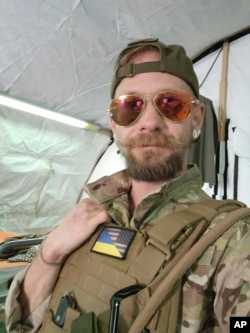 Eddy Etue, an American who left home for Ukraine to help in the fight against Russia, is shown in a selfie taken May 1, 2022. (Eddy Etue via AP)