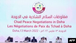 FILE - Participants take their seats on the podium as the Chad Peace Negotiations start in Qatar's capital Doha, on March 13, 2022.