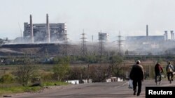 The damaged facilities of the Azovstal Iron and Steel Works the southern port city of Mariupol, Ukraine, are seen in this May 3, 2022, photo.
