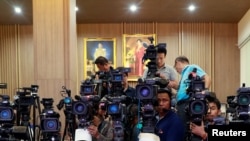 Reporters wait for the general election results in Bangkok, Thailand, March 24, 2019. REUTERS/Soe Zeya Tun