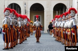 Swiss Guards attend their swearing-in ceremony at the Vatican, May 6, 2021. (REUTERS/Remo Casilli)