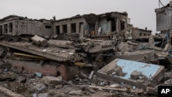 A damaged school is seen following a Russian attack occurred in mid-March, on the outskirts of Mykolaiv, Ukraine, April 1, 2022.