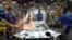 FILE - Iranian car workers weld parts of a car body, at the state-run Iran Khodro automobile manufacturing plant, which they claim is the largest car maker in the Middle East, near Tehran, Iran, April 20, 2011.