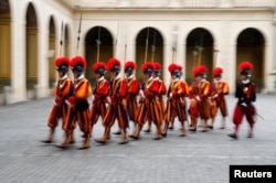 In this file photo, Swiss guards march at the Vatican June 4, 2018. (REUTERS/Tony Gentile/File Photo)