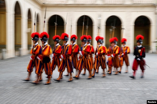 In this file photo, Swiss guards march at the Vatican June 4, 2018. (REUTERS/Tony Gentile/File Photo)