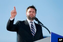 FILE - Republican Senate candidate J.D. Vance speaks at a rally in Delaware, Ohio, April 23, 2022.