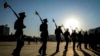 FILE - Members of the Ethiopian military march in downtown Addis Ababa, Ethiopia, Nov. 7, 2021. 