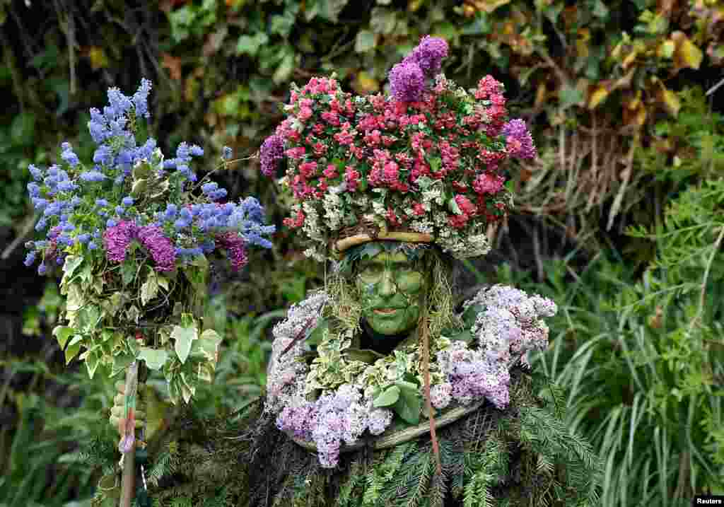 A person attends the yearly May Day bank holiday &quot;Jack In The Green&quot; parade and festival in Hastings, Britain.
