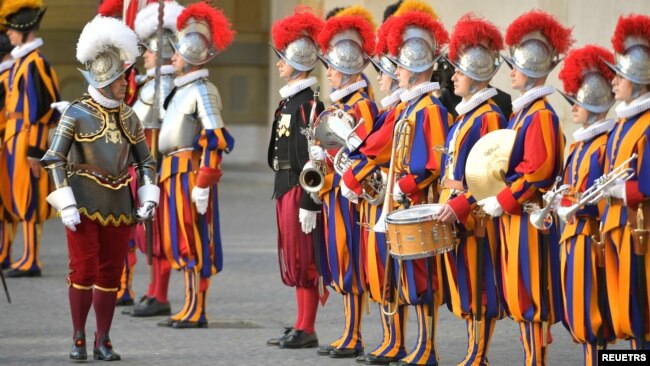 FILE - Swiss Guards attend a swearing-in ceremony at the Vatican, May 6, 2021. (Vatican Media/­Handout via REUTERS)