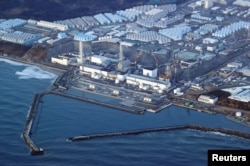 FILE - An aerial view shows the Fukushima Daiichi nuclear power plant following a strong earthquake, in Okuma town, Fukushima prefecture, Japan in this photo taken by Kyodo on March 17, 2022. (Kyodo/via Reuters)