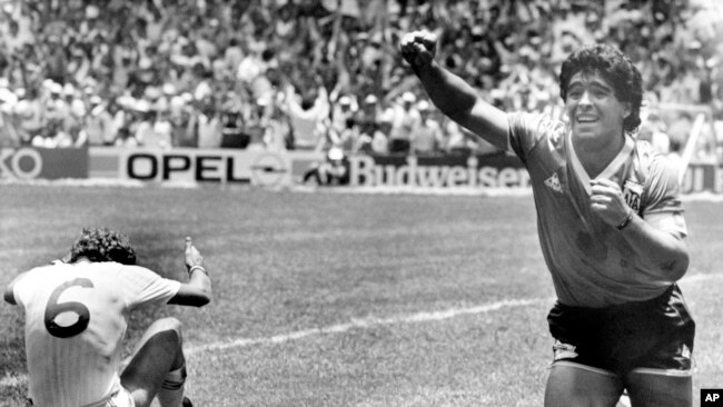 FILE - Argentina's Diego Maradona celebrates his second goal against England in the World Cup quarterfinal, in Mexico City, Mexico, June 22, 1986.