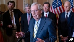 Senate Minority Leader Mitch McConnell, R-Ky., joined by the GOP leadership, meets with reporters at the Capitol in Washington, May 3, 2022.