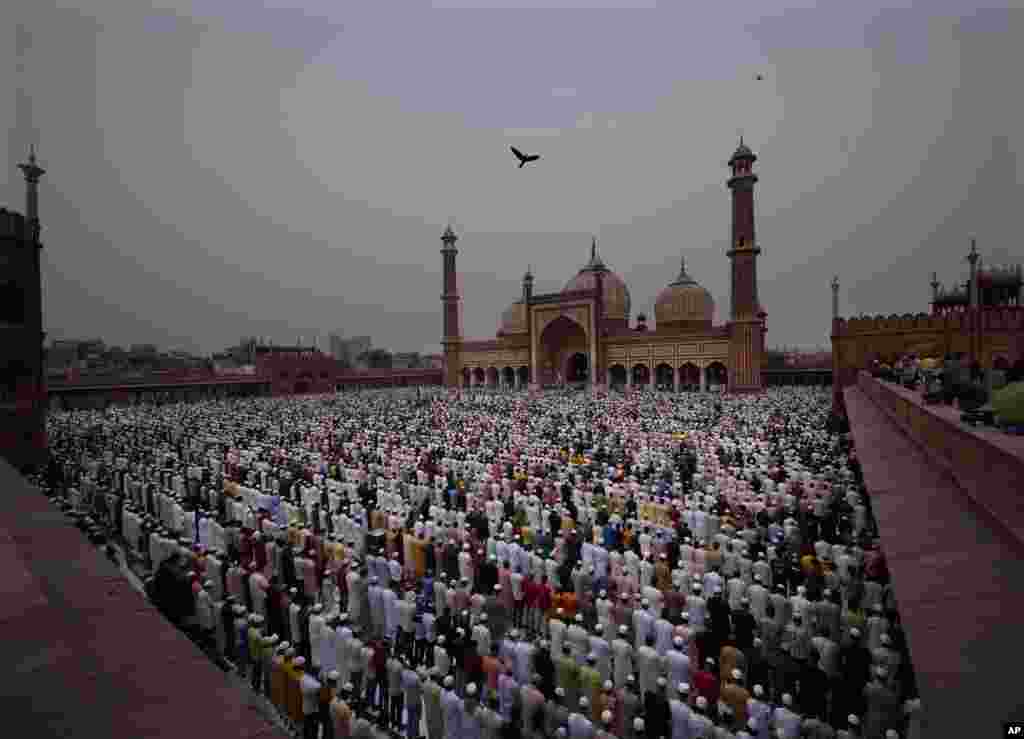 Muslims offer Eid al-Fitr prayers at the Jama Masjid in New Delhi, India.