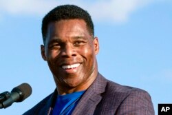 FILE - Georgia Republican Senate candidate Herschel Walker speaks in Perry, Ga., Sept. 25, 2021.