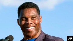 FILE - Georgia Republican Senate candidate Herschel Walker speaks in Perry, Ga., Sept. 25, 2021.