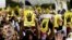 Protesters hold placards with the symbol of Rabaah al-Adawiya mosque, where supporters of Egypt's ousted President Morsi held a sit-in that was violently dispersed, Cairo, Sept. 13, 2013.
