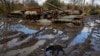 Russian tanks damaged in recent fighting are seen near the village of Kamianka, Kharkiv region, Ukraine, October 30, 2022. (AP Photo/Efrem Lukatsky)