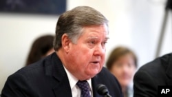 FILE - Republican Representative Ken Calvert of California speaks during a hearing in Washington, April 11, 2018. With millions of votes still uncounted Wednesday in California, uncertainty remained for about a dozen of the state's 52 House contests, including Calvert's.