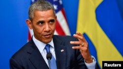 El presidente Barack Obama habla durante la conferencia de prensa conjunta con el primer ministro sueco, Fredrik Reinfeldt.