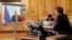 French President Emmanuel Macron talks with Russian President Vladimir Putin during a video conference at the Elysee Palace in Paris, France, June 26, 2020.