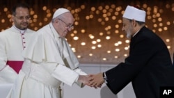 Pope Francis greets Sheikh Ahmed el-Tayeb, the grand imam of Egypt's Al-Azhar, after an Interreligious meeting at the Founder's Memorial in Abu Dhabi, United Arab Emirates, Feb. 4, 2019.